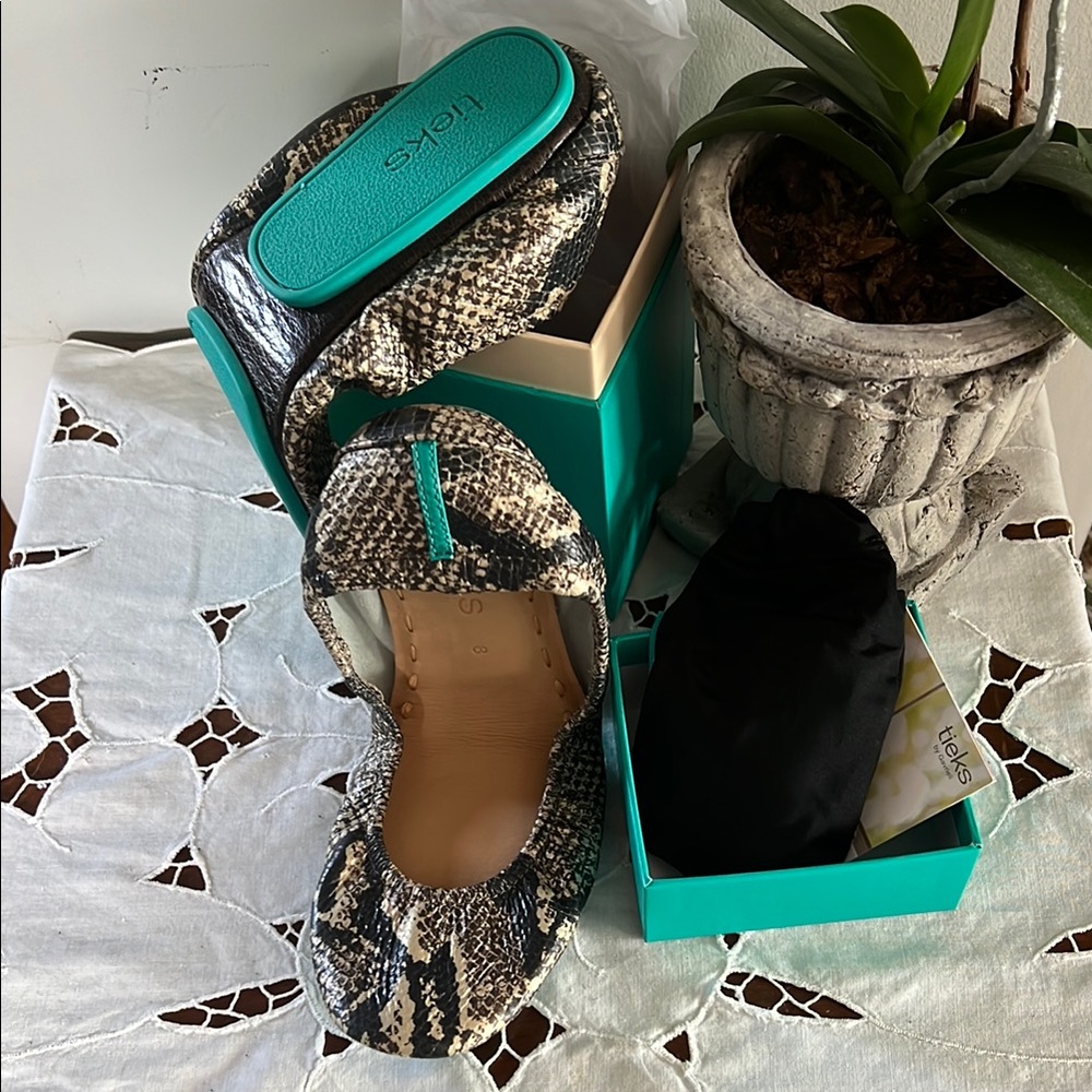 Tieks Black and Gold Snakeskin Flats with Timeless Elegance